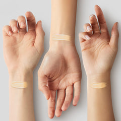 Jung Saem Mool Essential Skin Nuder cushion dabbed on skin demonstrates high coverage.