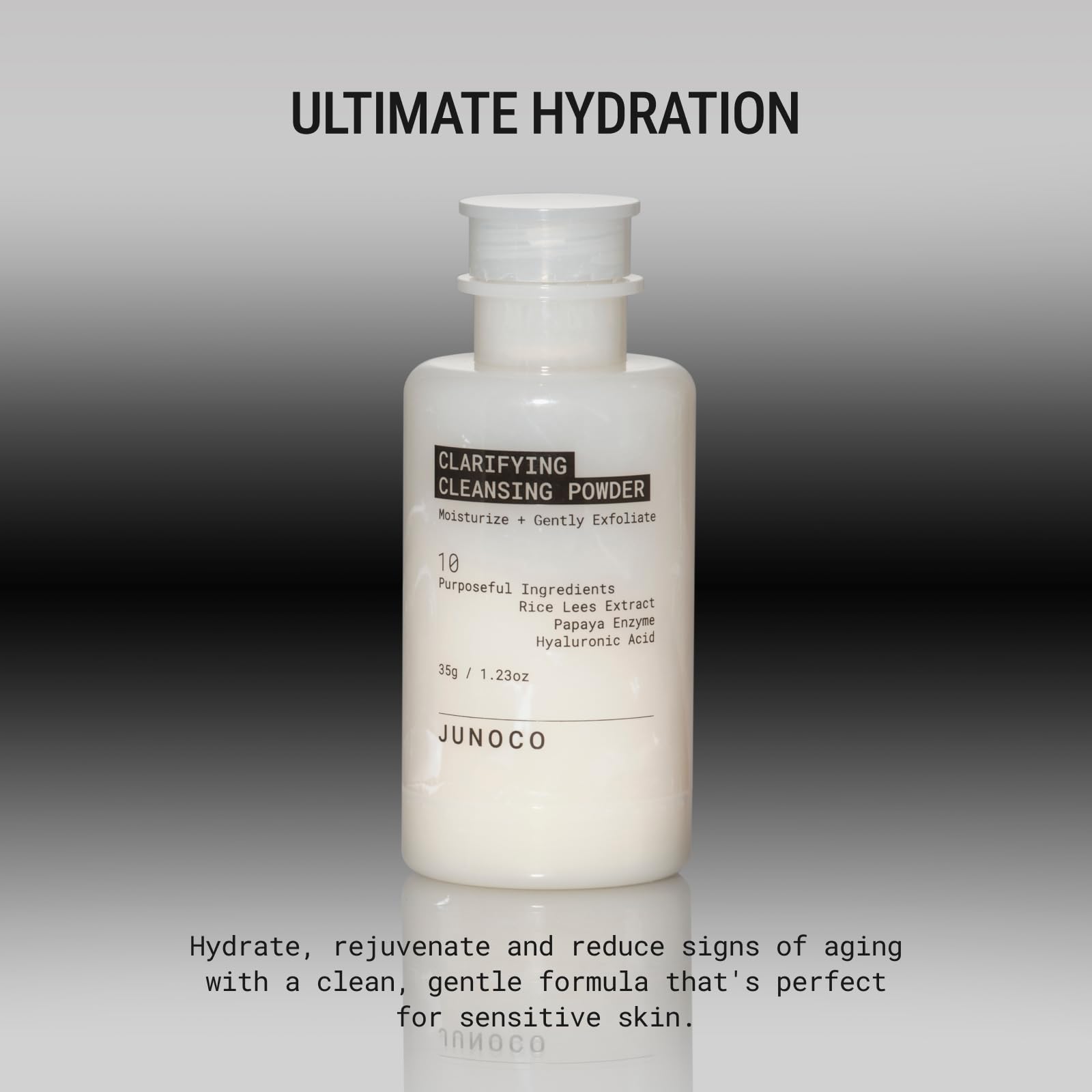 JADE cleansing powder close-up shows rice powder and papaya enzymes for hydration.