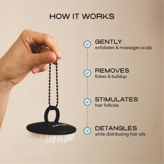 Jupiter scalp exfoliator finger ring grip demonstrating secure control and reduced slipping