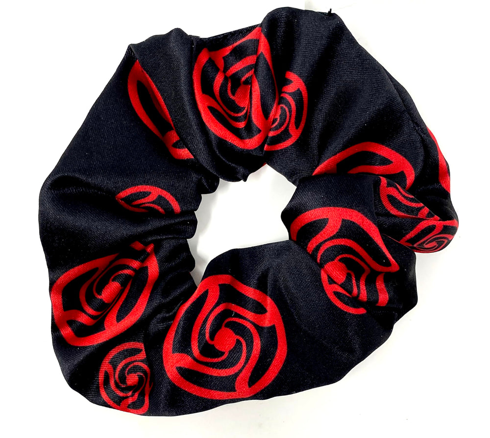 JUST FUNKY Jujutsu Kaisen logo scrunchie as chic fashion accessory for daily looks.