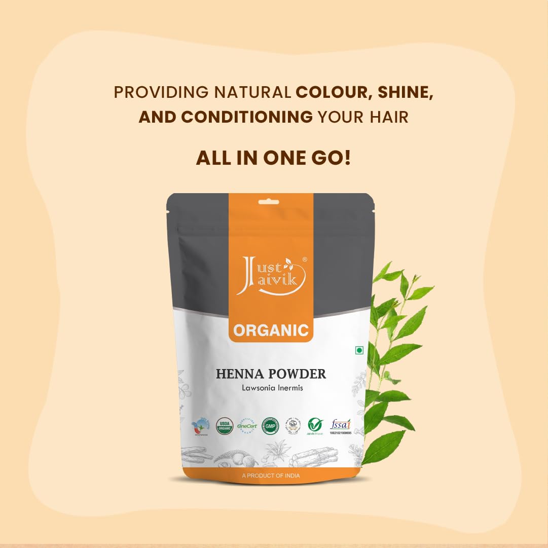 Just Jaivik Henna Powder on hair—potentially strengthens and conditions with natural dye.