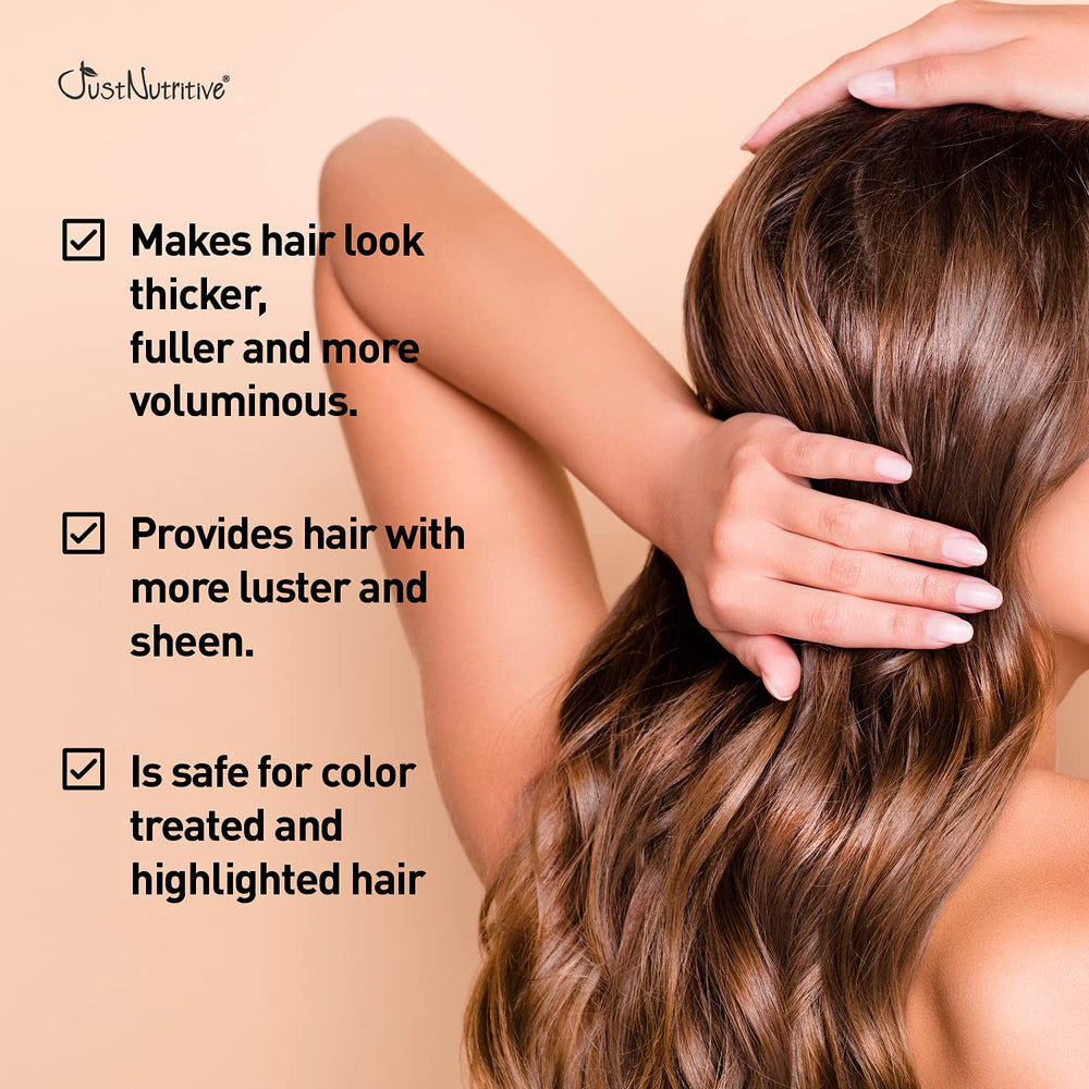 Just Nutritive Hair Loss Shampoo label closeup showcases plant-based ingredients supporting scalp health.