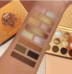 Juvia's Place Nubian Earth white copper shimmer swatch adds light-reflecting glow.