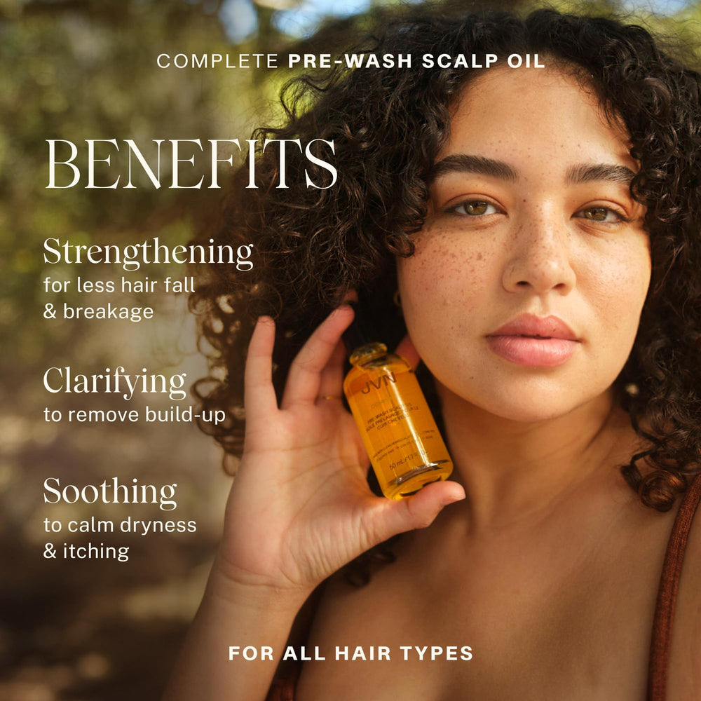 JVN pre-wash scalp oil dropper applying to scalp for targeted care