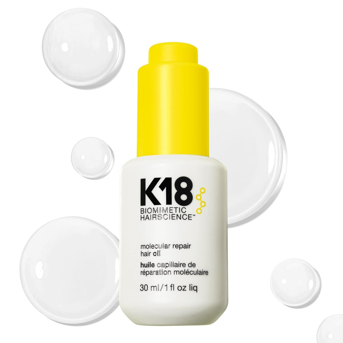 K18 Molecular Repair Hair Oil bottle demonstrates weightless frizz repair.