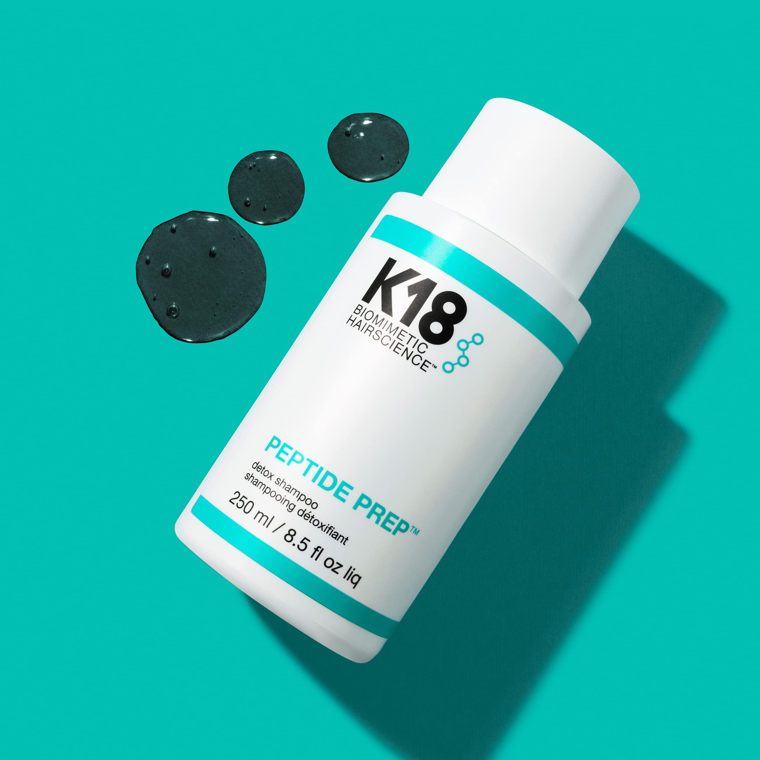 K18 PEPTIDE PREP Detox Shampoo being applied to scalp for a thorough cleanse