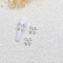 KACHIMOO bow nail charms on nails demonstrates easy, durable nail art application.