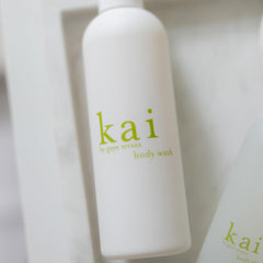 Kai Body Wash packaging with recycling symbol, signaling eco-friendly vegan care.