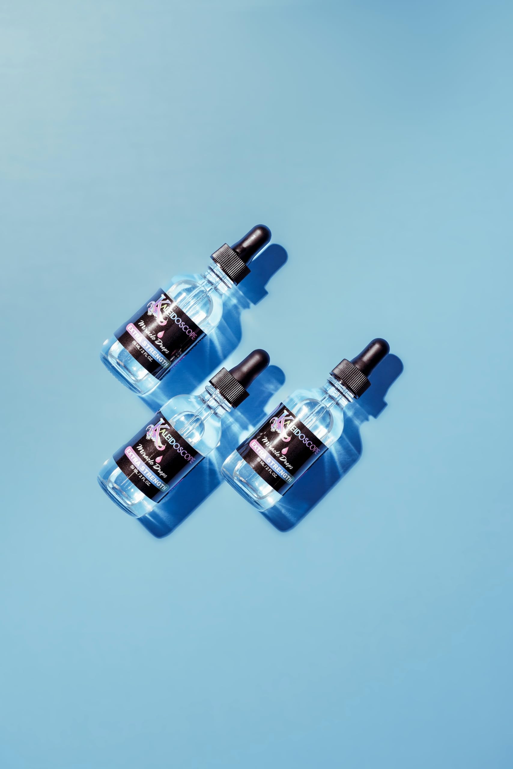 Kaleidoscope Miracle Drops Extra Strength scalp massage application promotes circulation and relief.