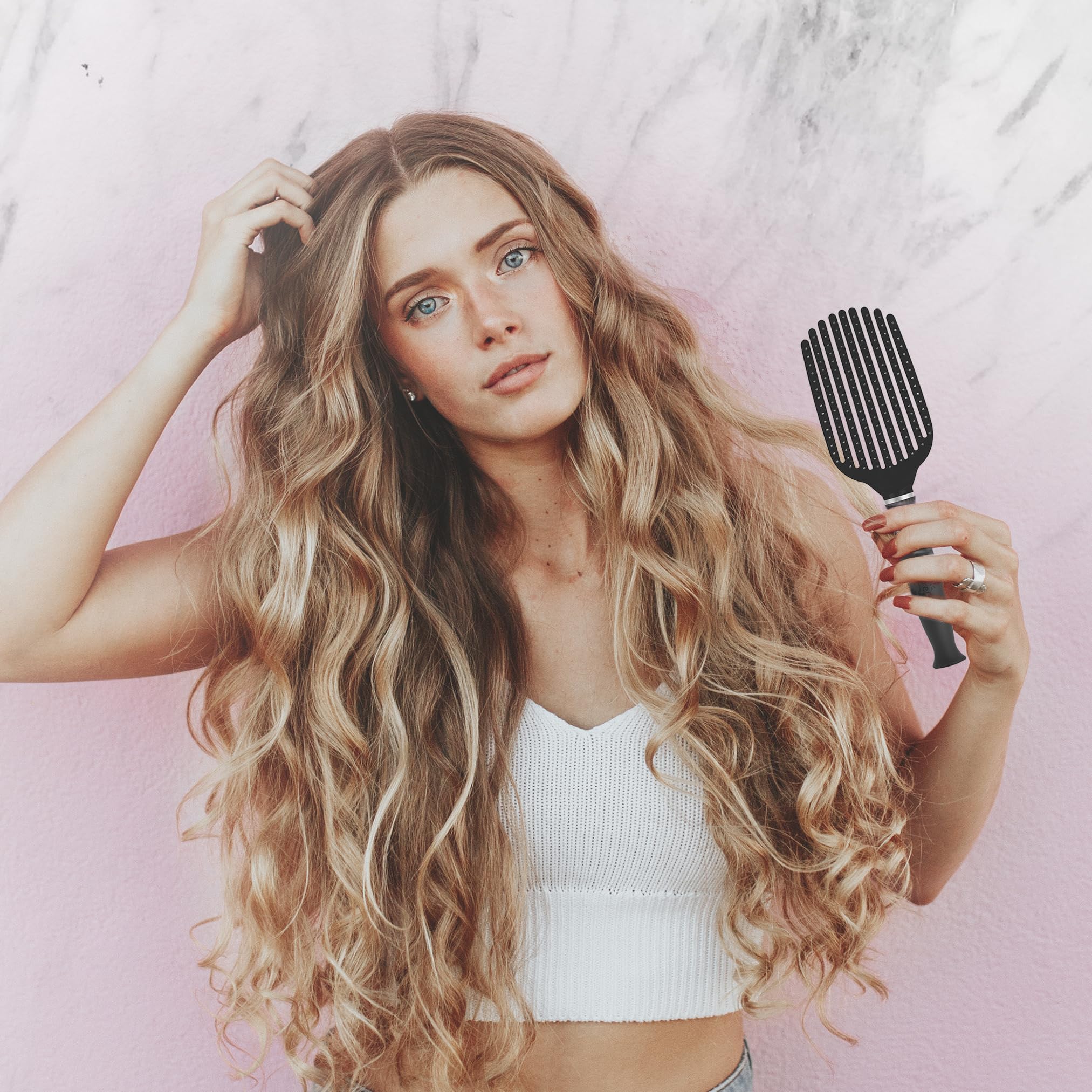 KareCo Tangle Buster Brush compact travel-case-ready detangler for bags.