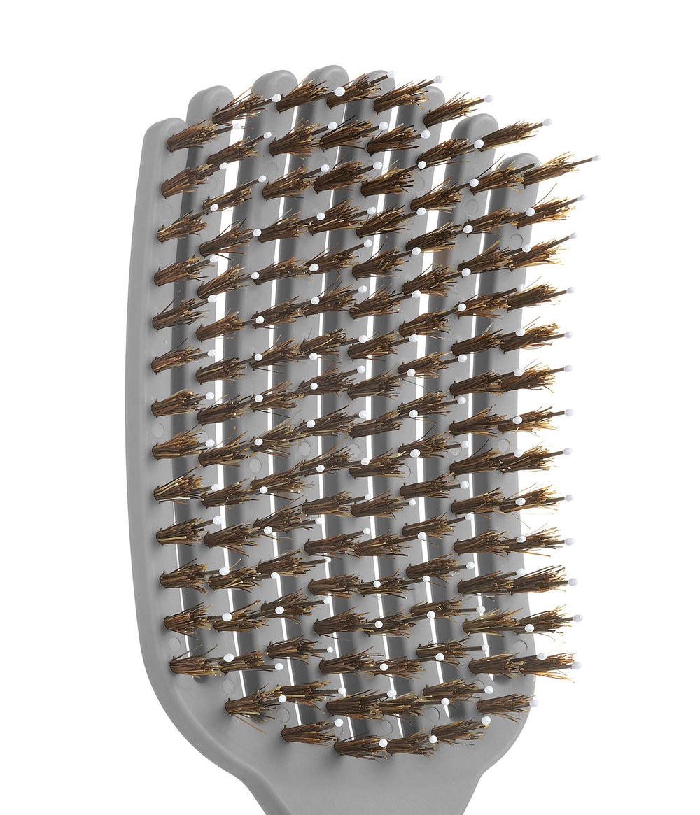 KareCo Tangle Buster detangling wet and dry hair with snag-free glide.