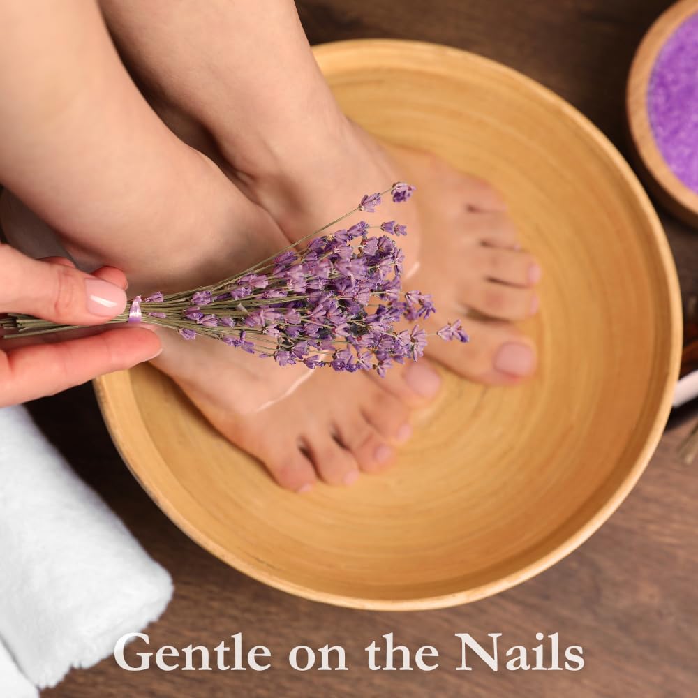 Karma Organic nail polish remover wipes in use on nails for gentle polish removal.