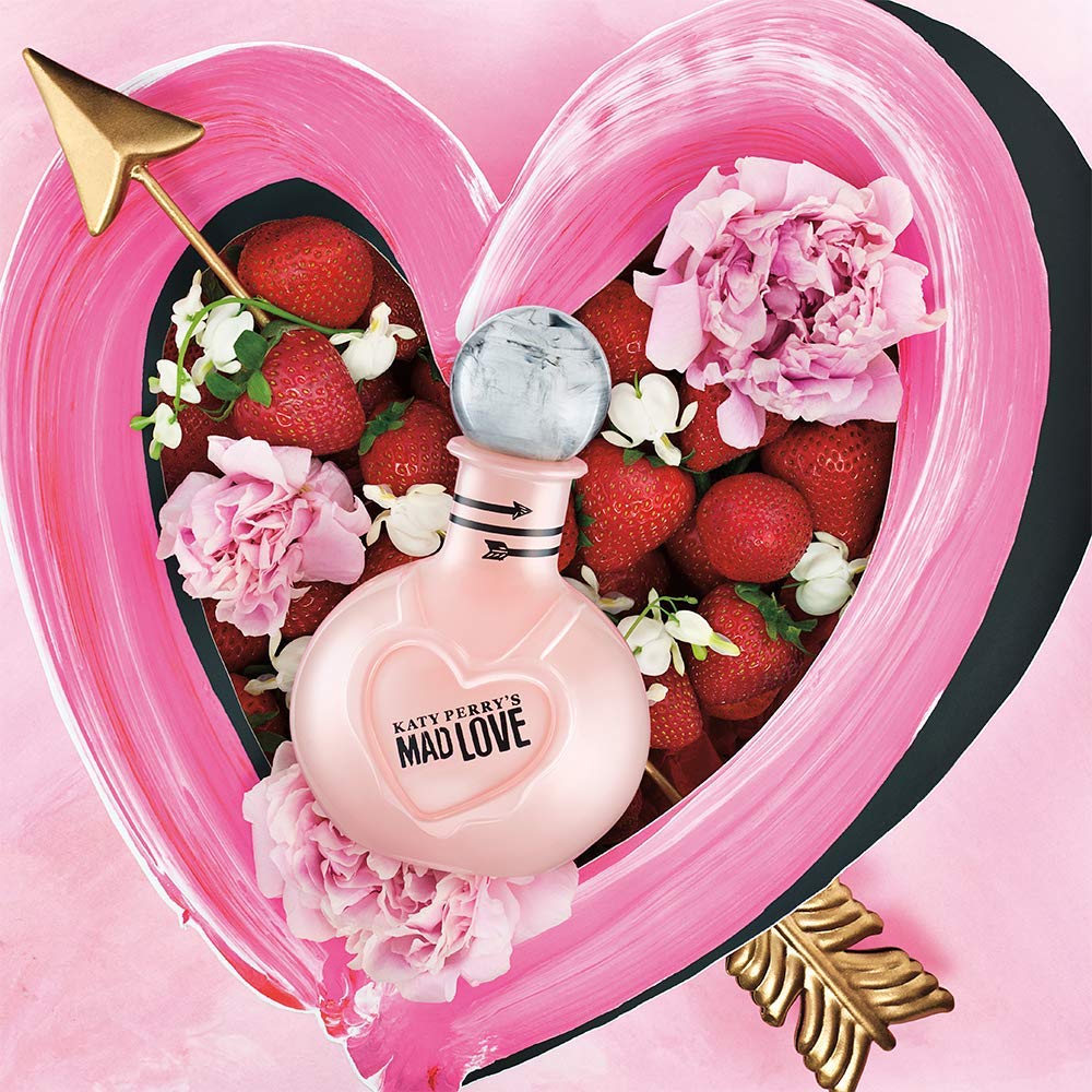 Katy Perry Mad Love application spray demonstrates convenient mist