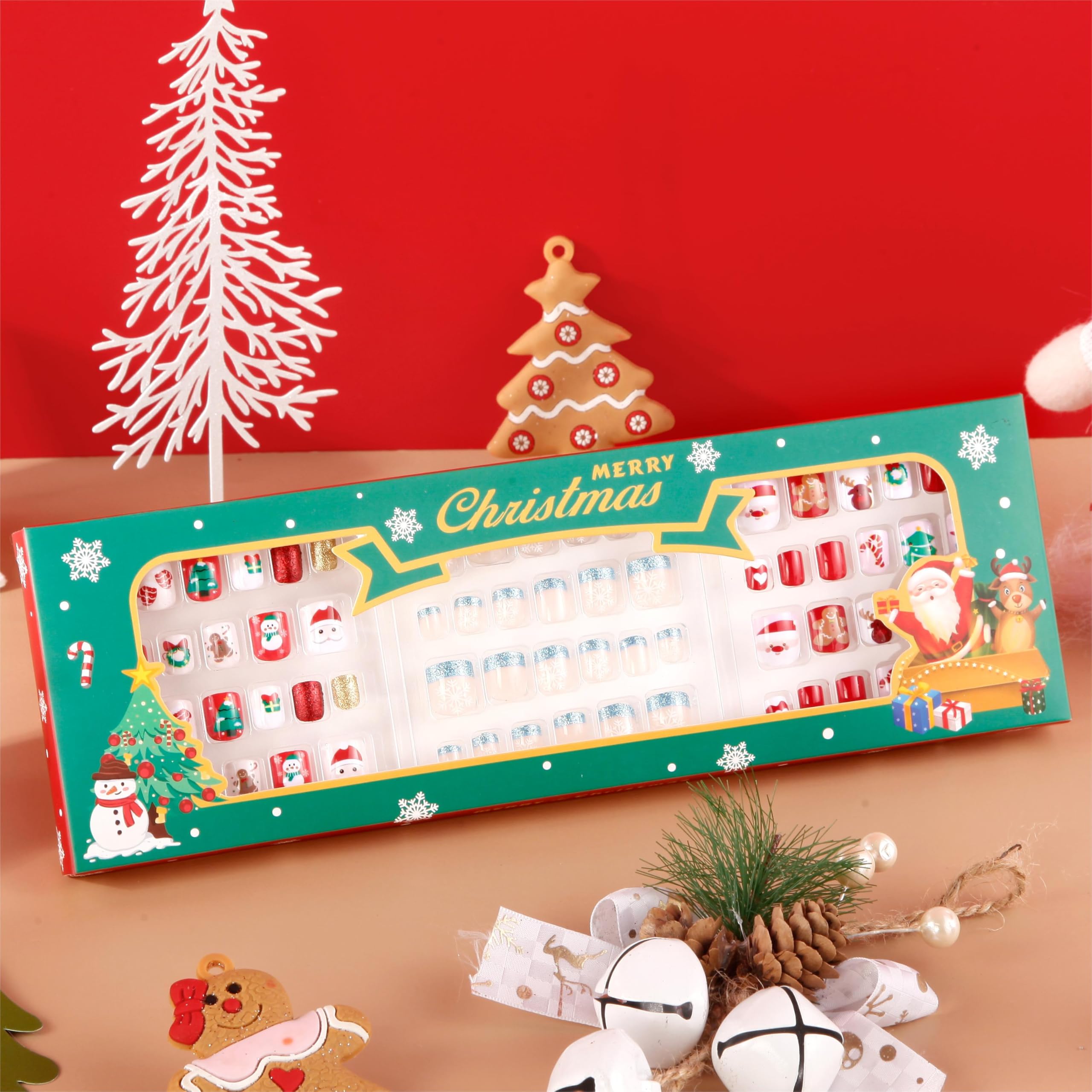 Kawyehu golden snow pattern nails close-up showcases glamorous winter-inspired style.