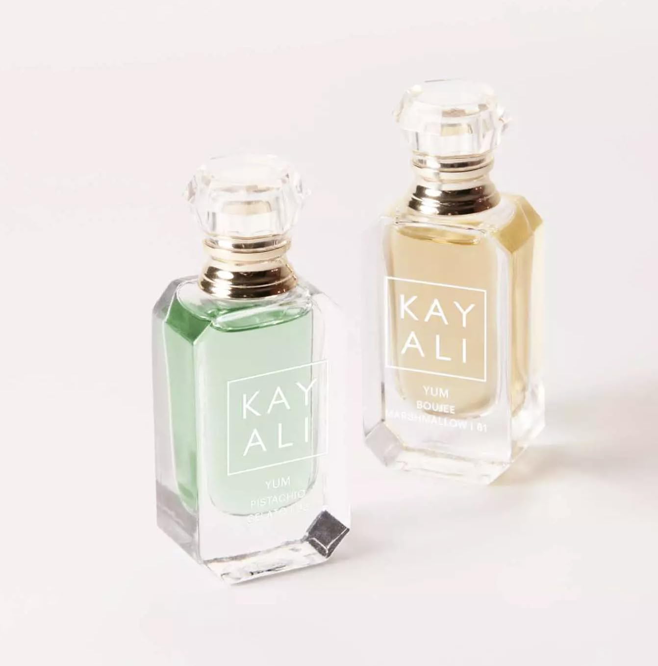 KAYALI Diamond-cap closeup—opulent jeweled lid highlights premium bottle design
