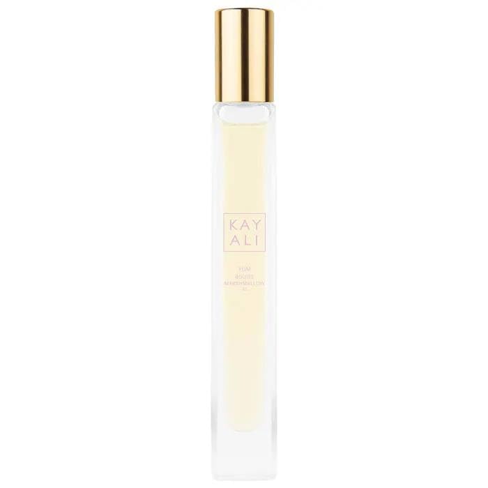 KAYALI Yum Boujee Marshmallow 81 travel spray, portable luxury fragrance for on-the-go use.