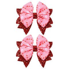KCHIES Glitter Pink Candy Cane Bow Clip front view adds festive sparkle.