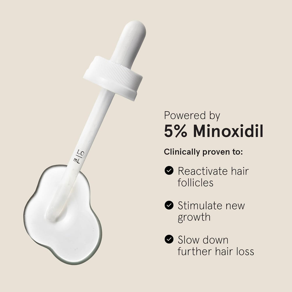 Keeps hair-growth serum close-up with unscented topical formula.