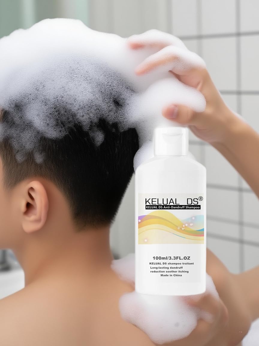 Kelual DS applying shampoo on scalp demonstrates the initial cleanse step in routine.