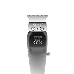 KEMEI 2293 orange trimmer in use on beard for smooth, controlled shaping.