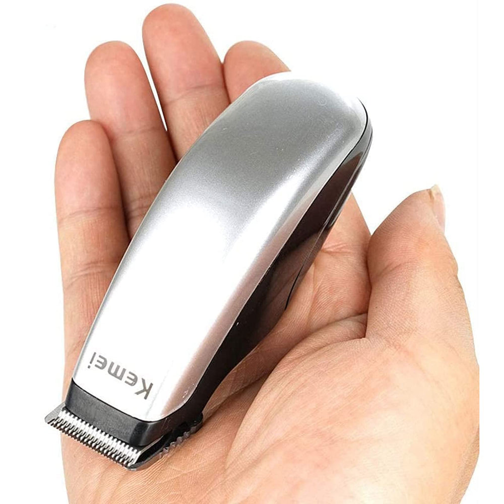 KEMEI mini-clippers palm-size cordless design for precise on-the-go grooming.