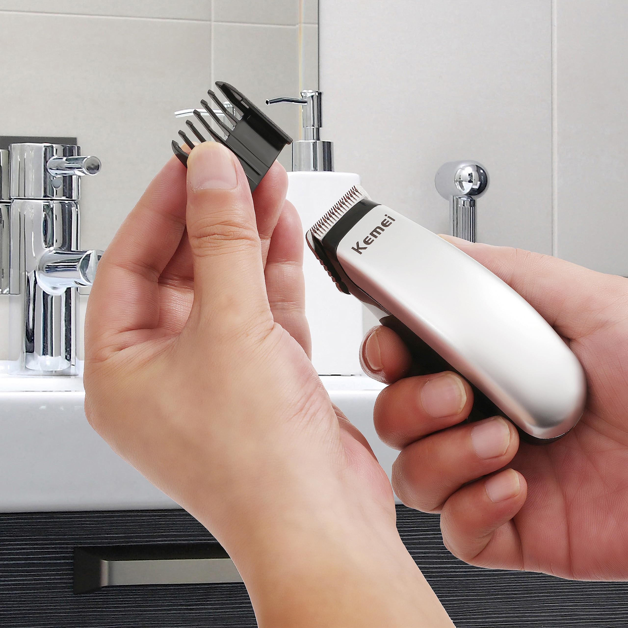 KEMEI Mini Hair Trimmer with three guide combs for versatile styling options.