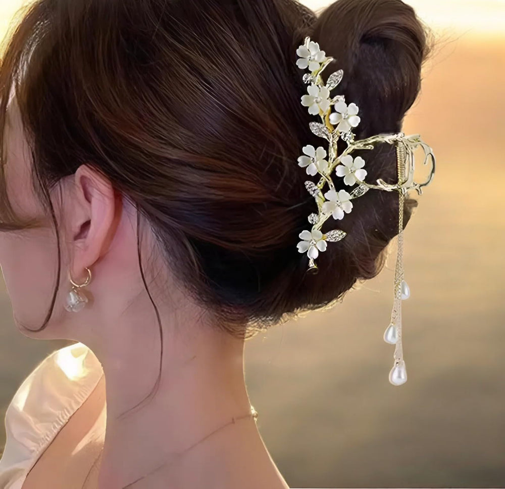 KEMMINTVN dangling pearl drops enhance buns with delicate movement.