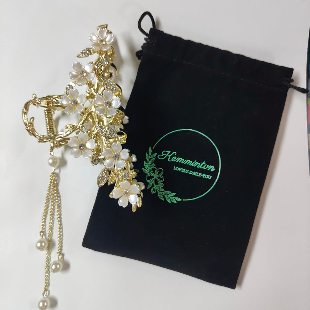 KEMMINTVN Pearl tassel bun holder showcases dangling pearls for sophisticated everyday styling.