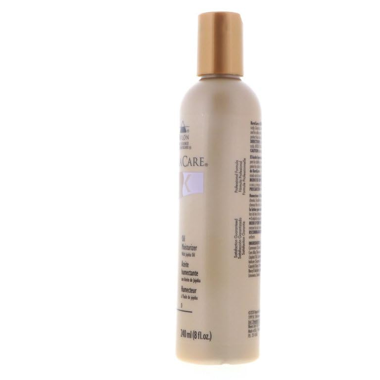 KeraCare Oil Moisturizer hair softness application depicts silky texture and easy combing.