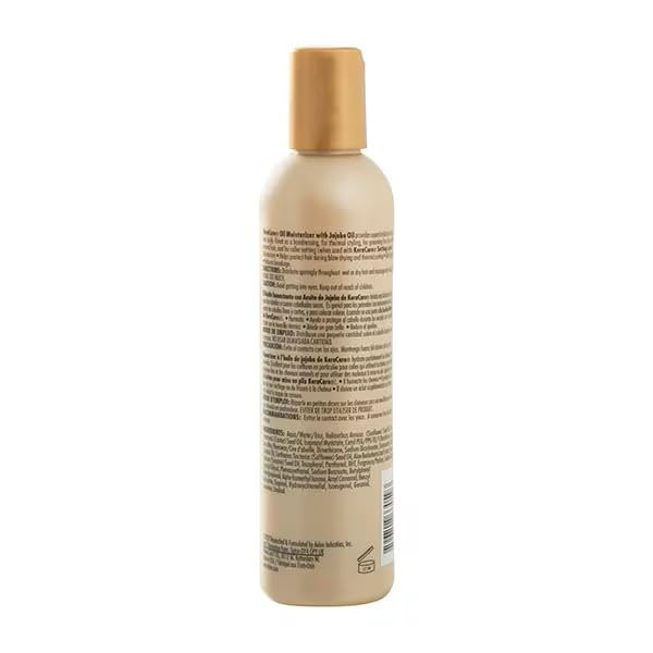 KeraCare Oil Moisturizer jojoba oil closeup highlighting hydrating nourishment for dry strands.