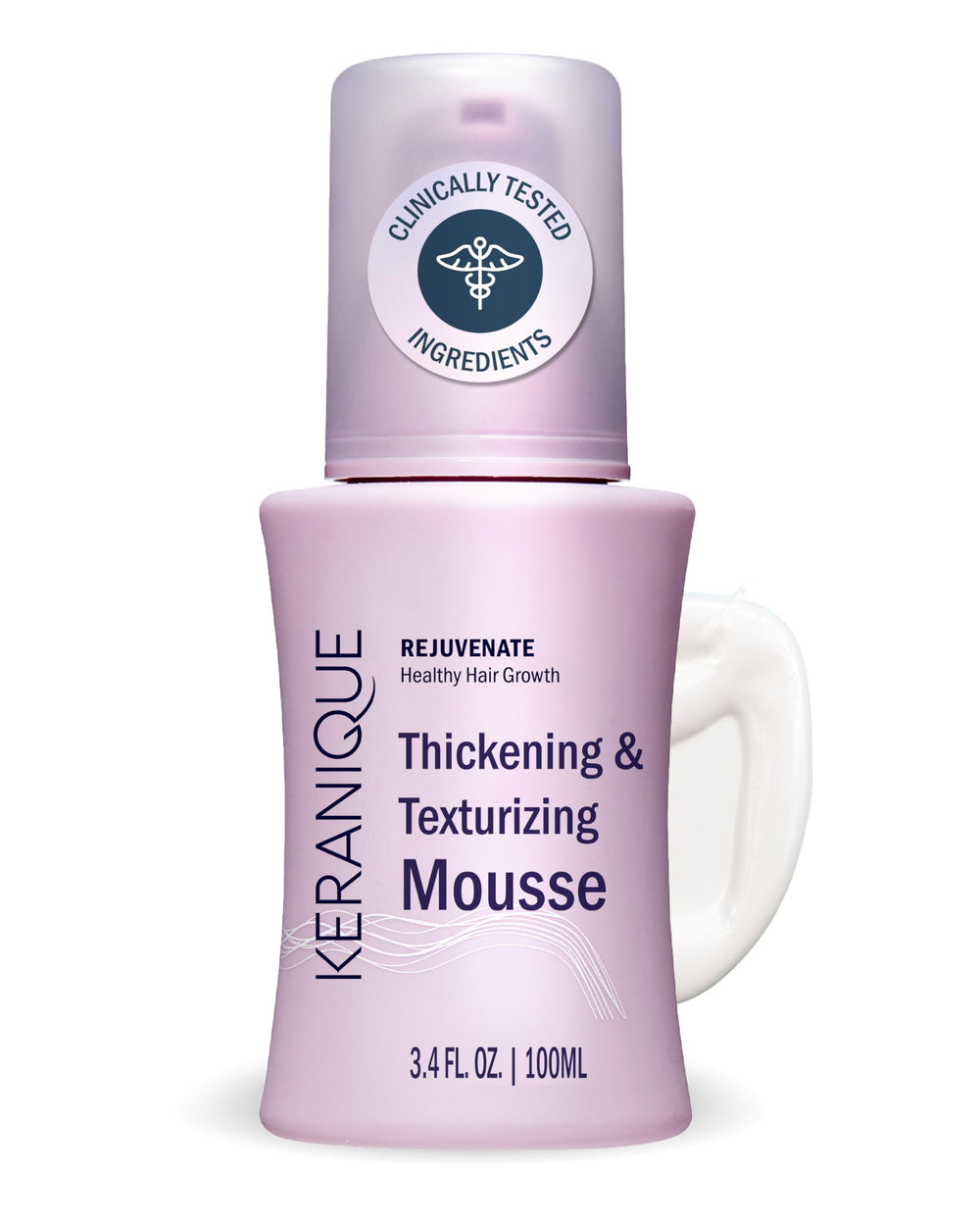 Keranique volumizing mousse bottle on vanity offers instant volume and soft hold.