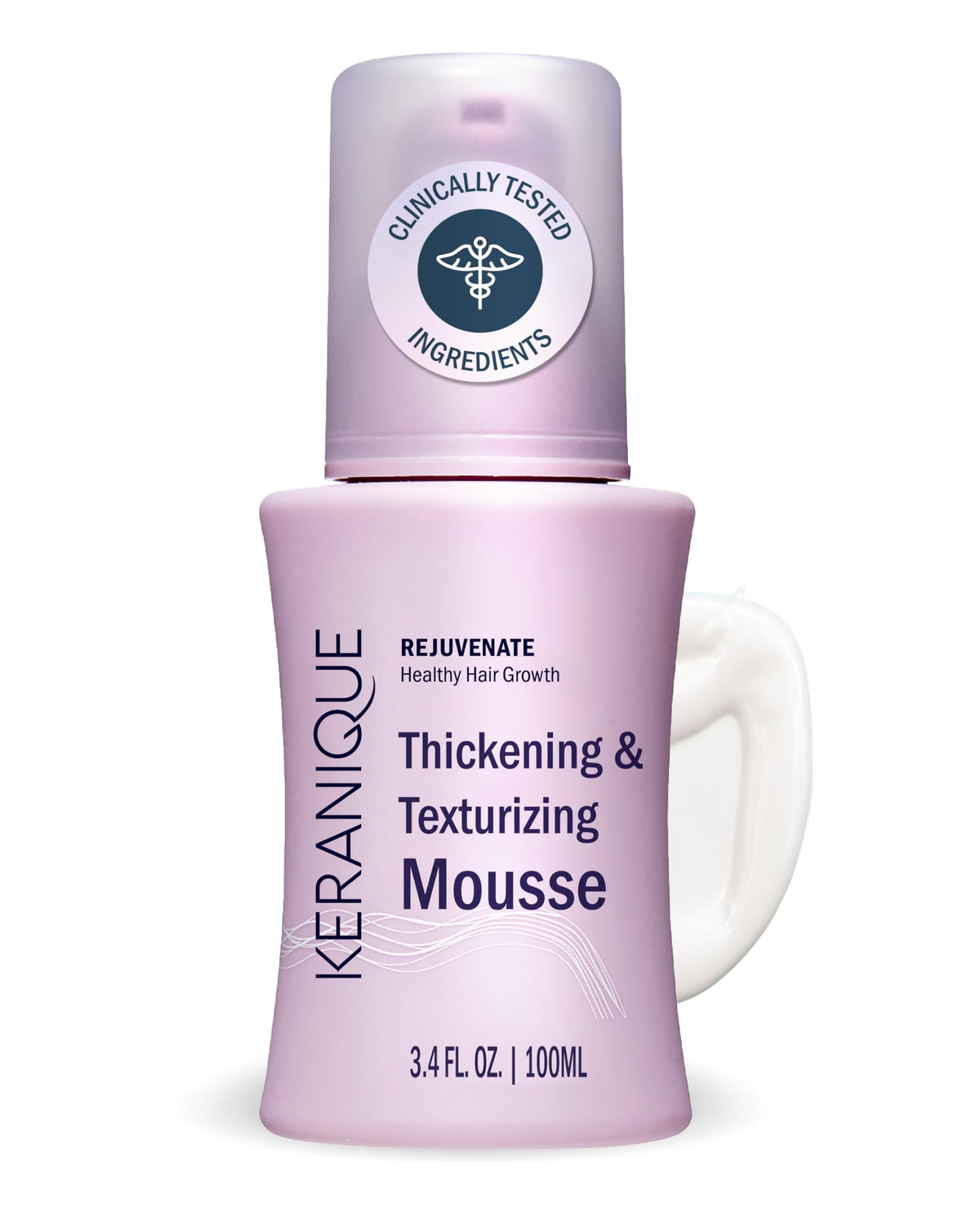 Keranique volumizing mousse bottle on vanity offers instant volume and soft hold.