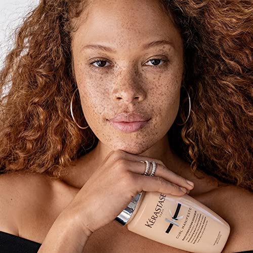 KÉRASTASE Curl Manifesto frizz-control glow on curls for smoother look.