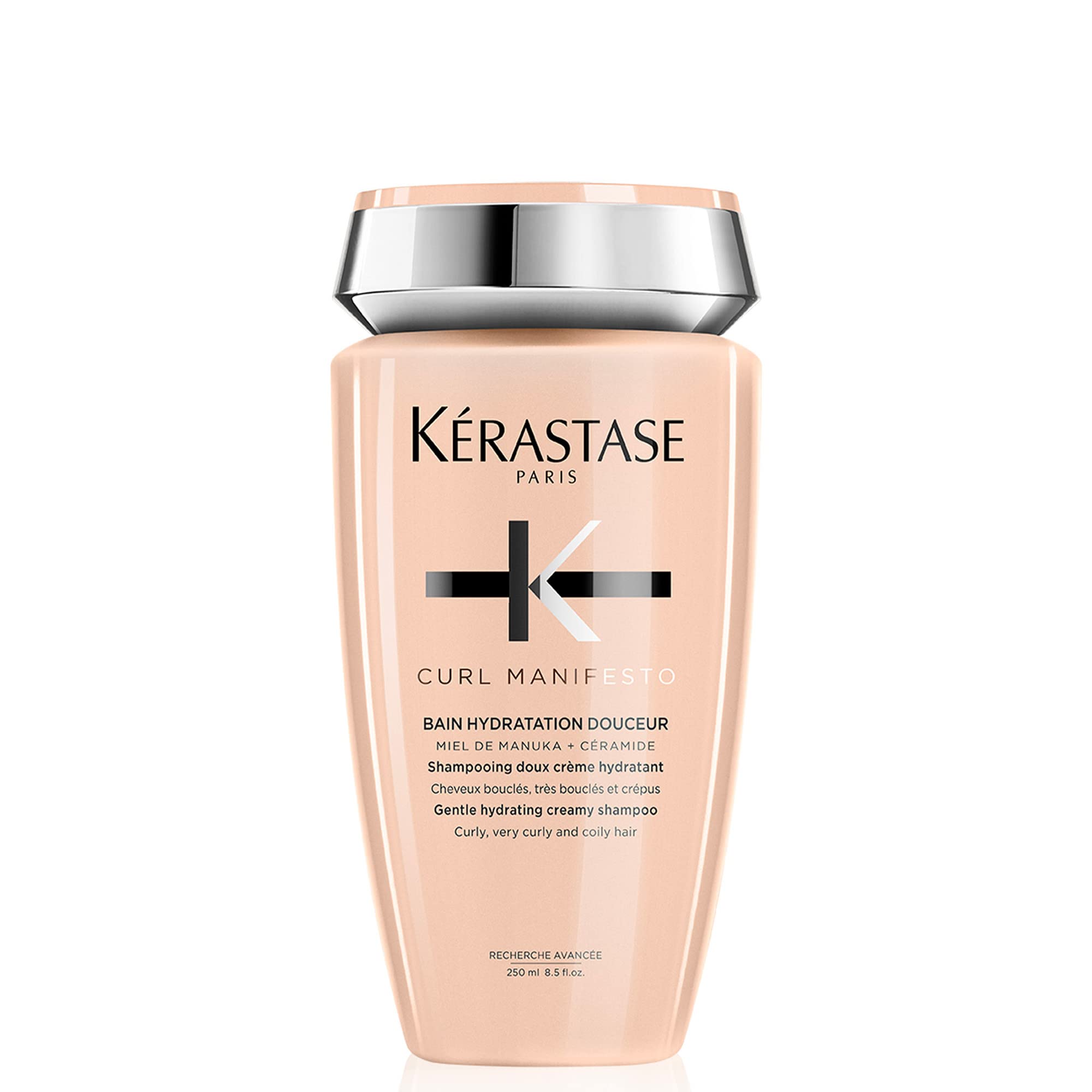 KÉRASTASE Curl Manifesto shampoo bottle delivers gentle cleanse and hydration for curls.