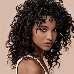 KÉRASTASE Fluidissime on towel-dried hair highlights smoothing of fibers and reduced frizz