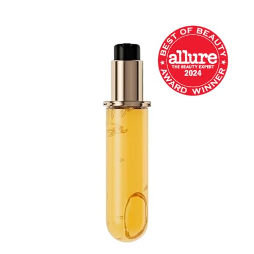 KÉRASTASE Elixir Ultime oil dispense enables even application for frizz control.
