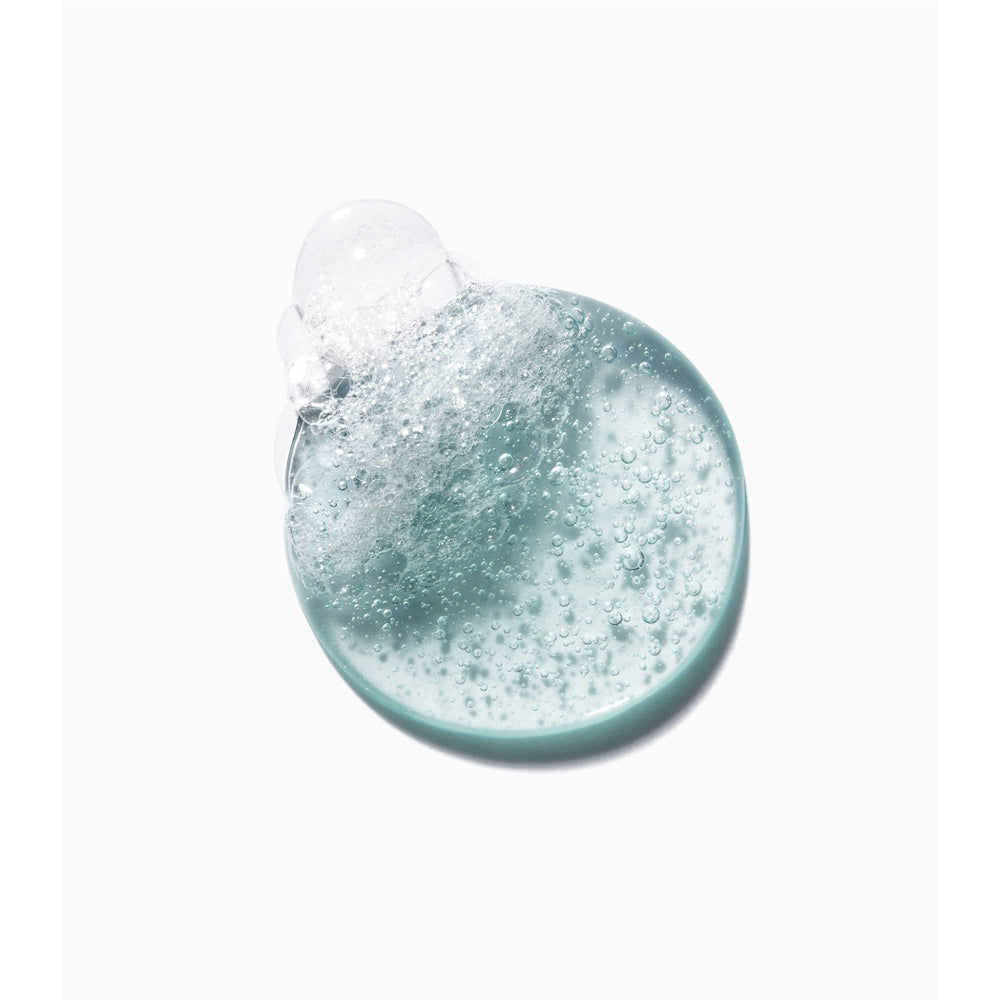 Kerastase Genesis Homme weakened-hair shot implies thicker-feeling hair