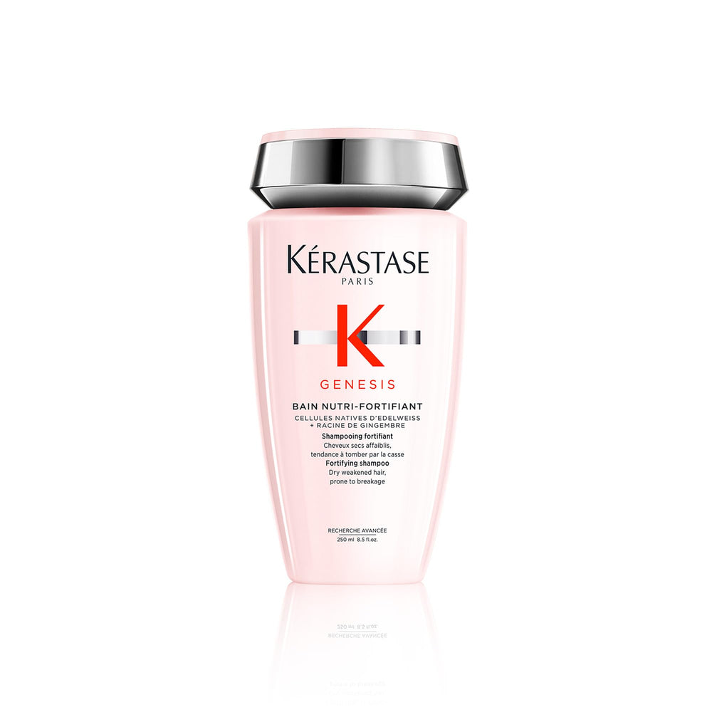 KÉRASTASE Genesis Strengthening Shampoo packaging signals premium care for weakened hair.