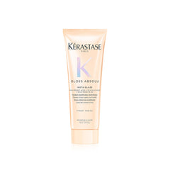 Kerastase Gloss Absolu bottle shows sleek packaging delivering deep hydration and radiant shine.