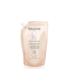Kerastase Gloss Absolu shampoo bottle showcases premium glossy finish for frizz-free hair