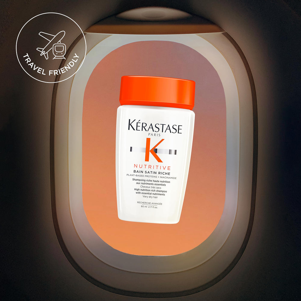KÉRASTASE Bain Satin Riche bottle gleams beside shiny hair post-wash