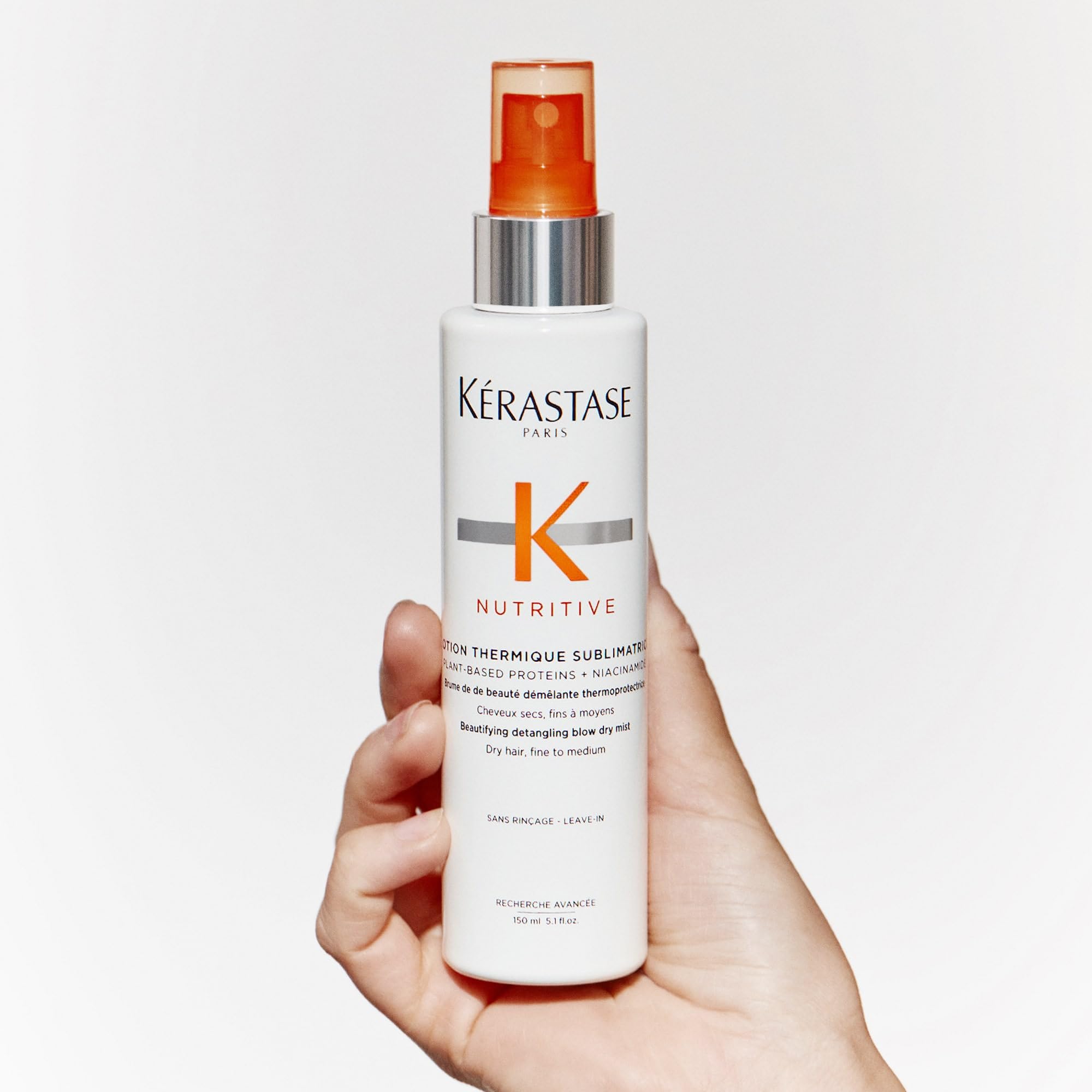 Kérastase Nutritive heat protecting spray shine-finish enhances natural luster after styling