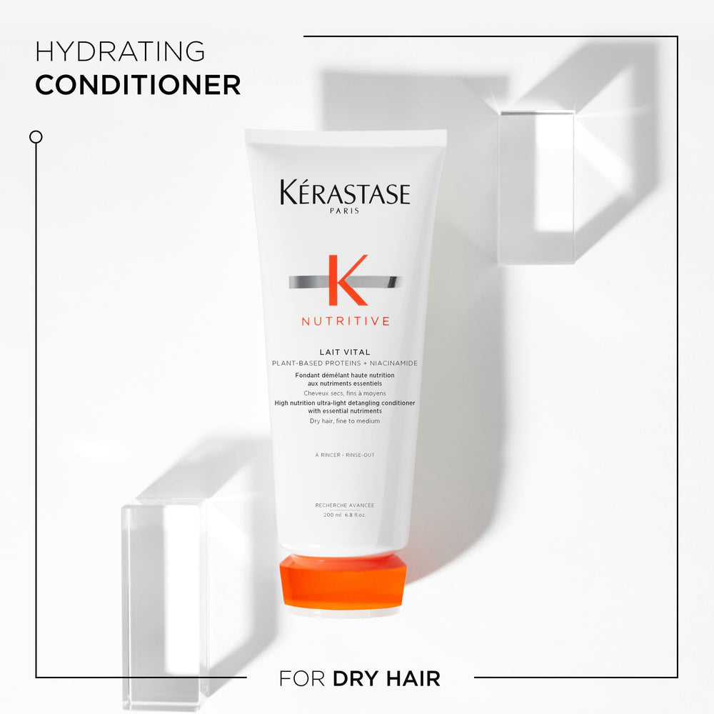 KÉRASTASE Nutritive Lait Vital applying conditioner onto wet hair for even distribution.