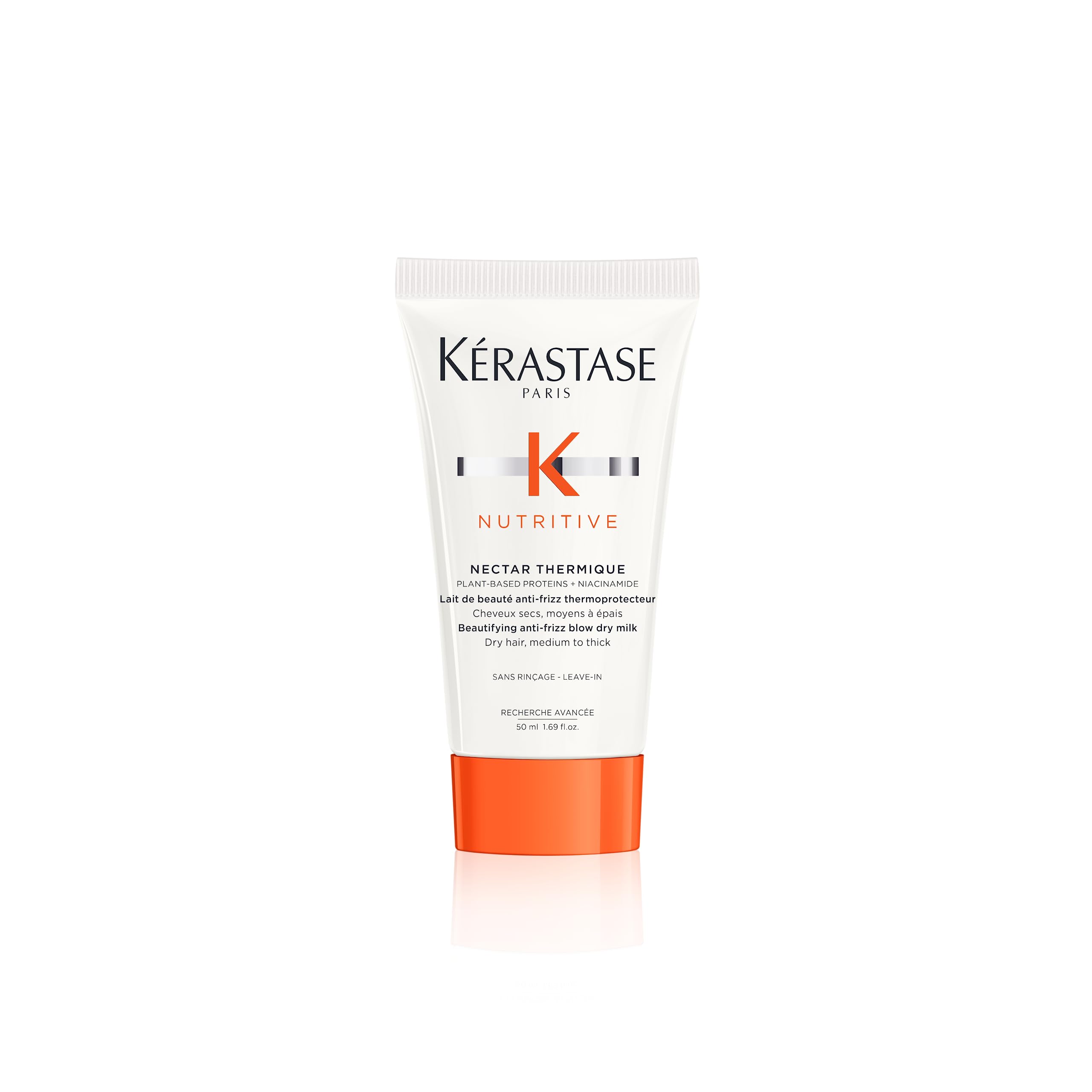 KÉRASTASE Nutritive Nectar Thermique bottle close-up showing heat protection up to 450°F.