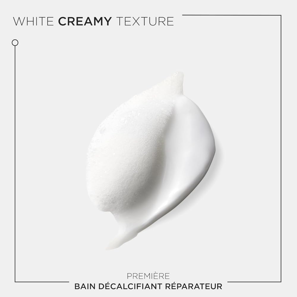 KÉRASTASE Première repairing conditioner duo display suggests complete care.