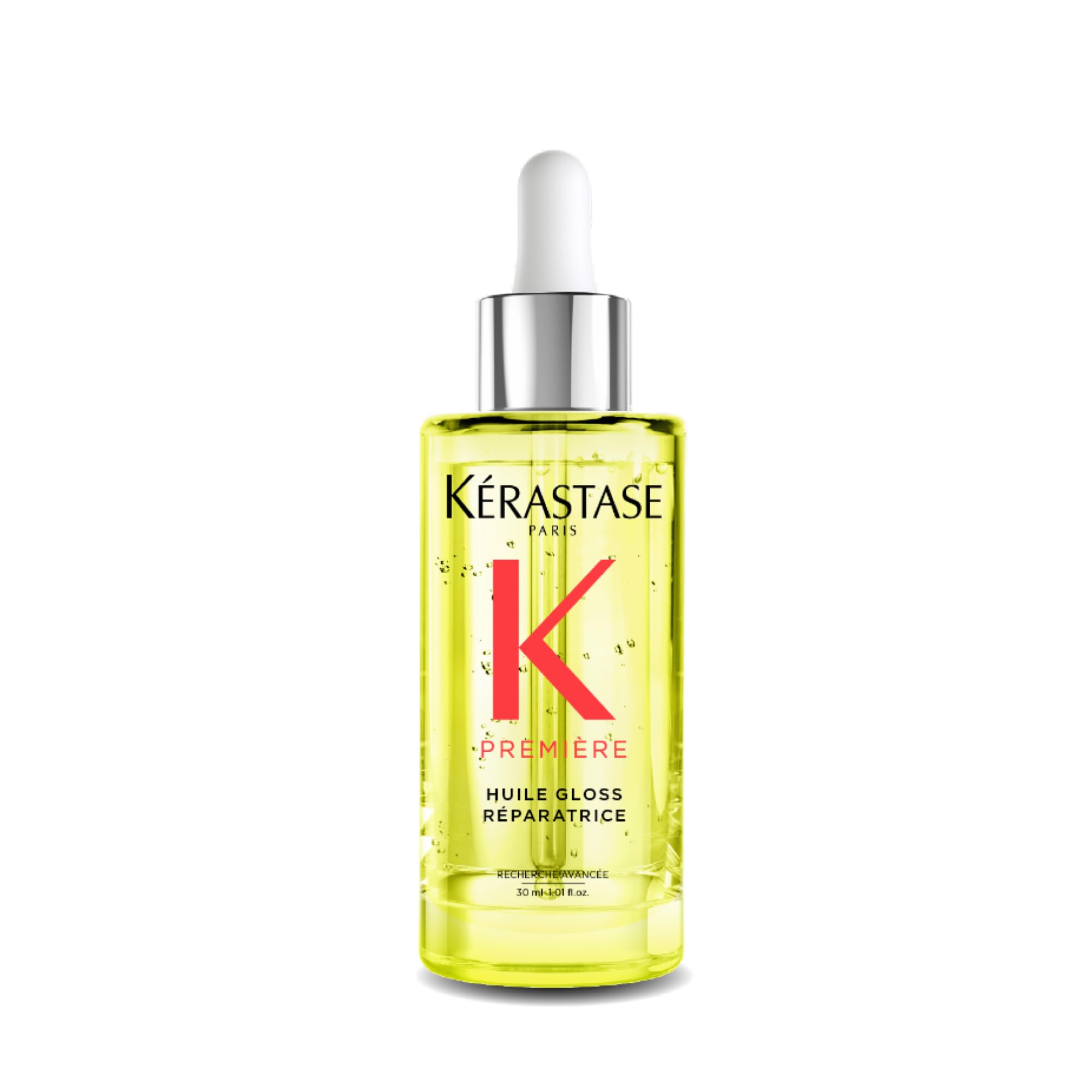 KÉRASTASE Première Repairing Gloss Oil bottle highlights fortifying shine-enhancing formula.