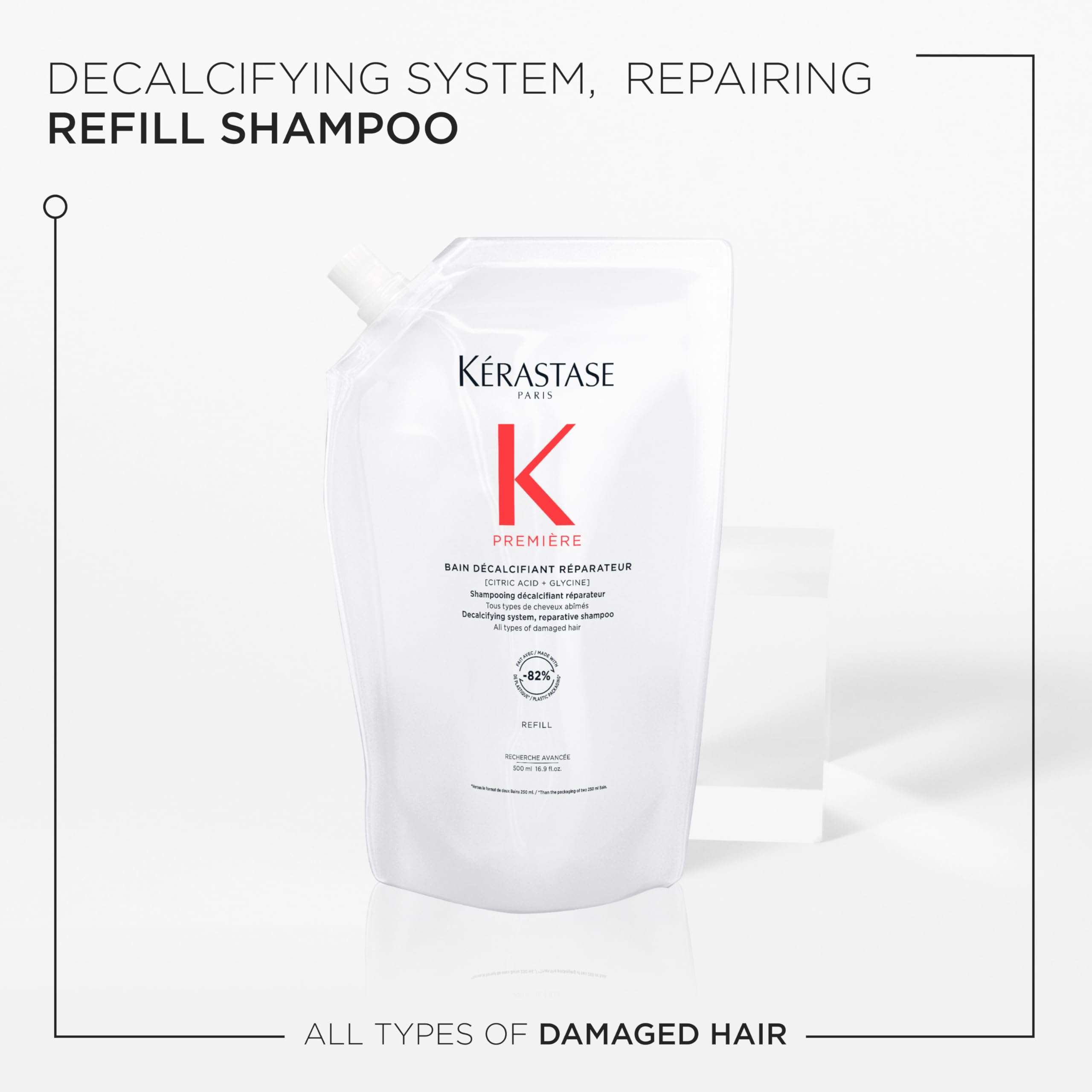 Kerastase Premiere bottle in shower illustrating decalcification concept.