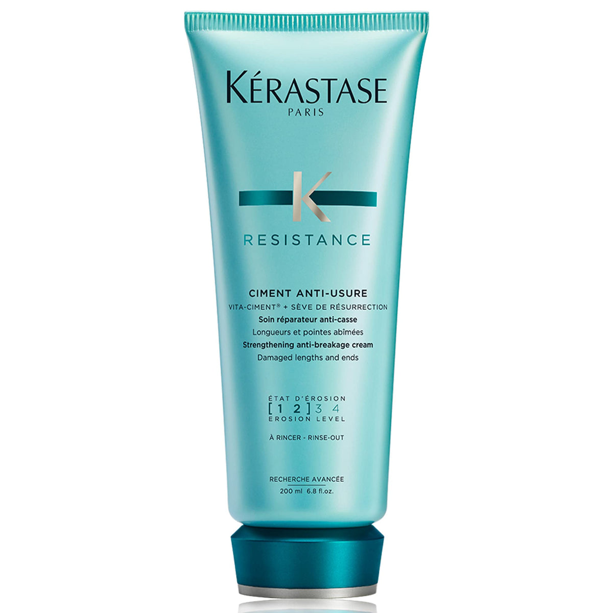 KÉRASTASE Resistance Ciment Anti-Usure bottle pouring, signaling restorative care for damaged hair