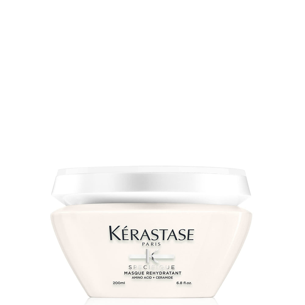 KÉRASTASE Specifique Rehydratant bottle close-up showing lightweight hydration for sensitive hair.