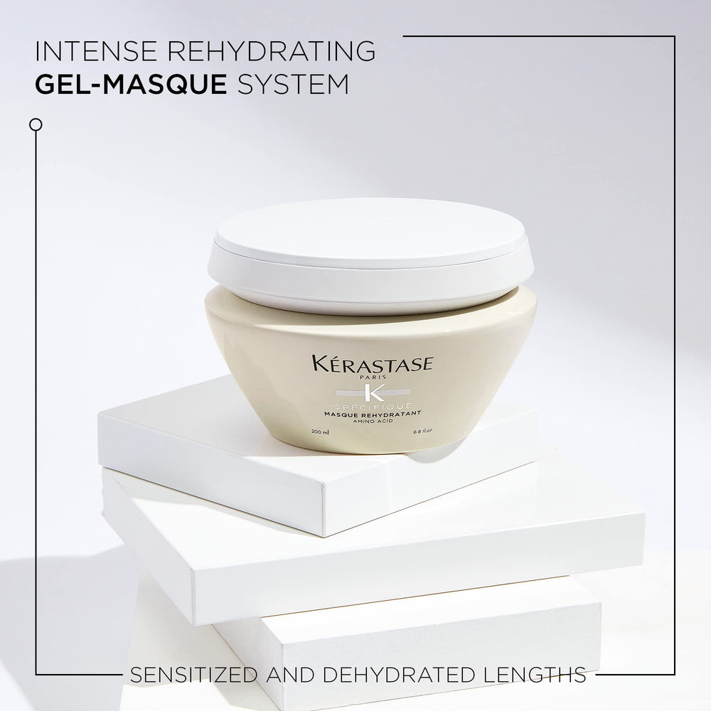 KÉRASTASE Specifique Rehydratant texture swatch highlighting detangle-friendly hydration.
